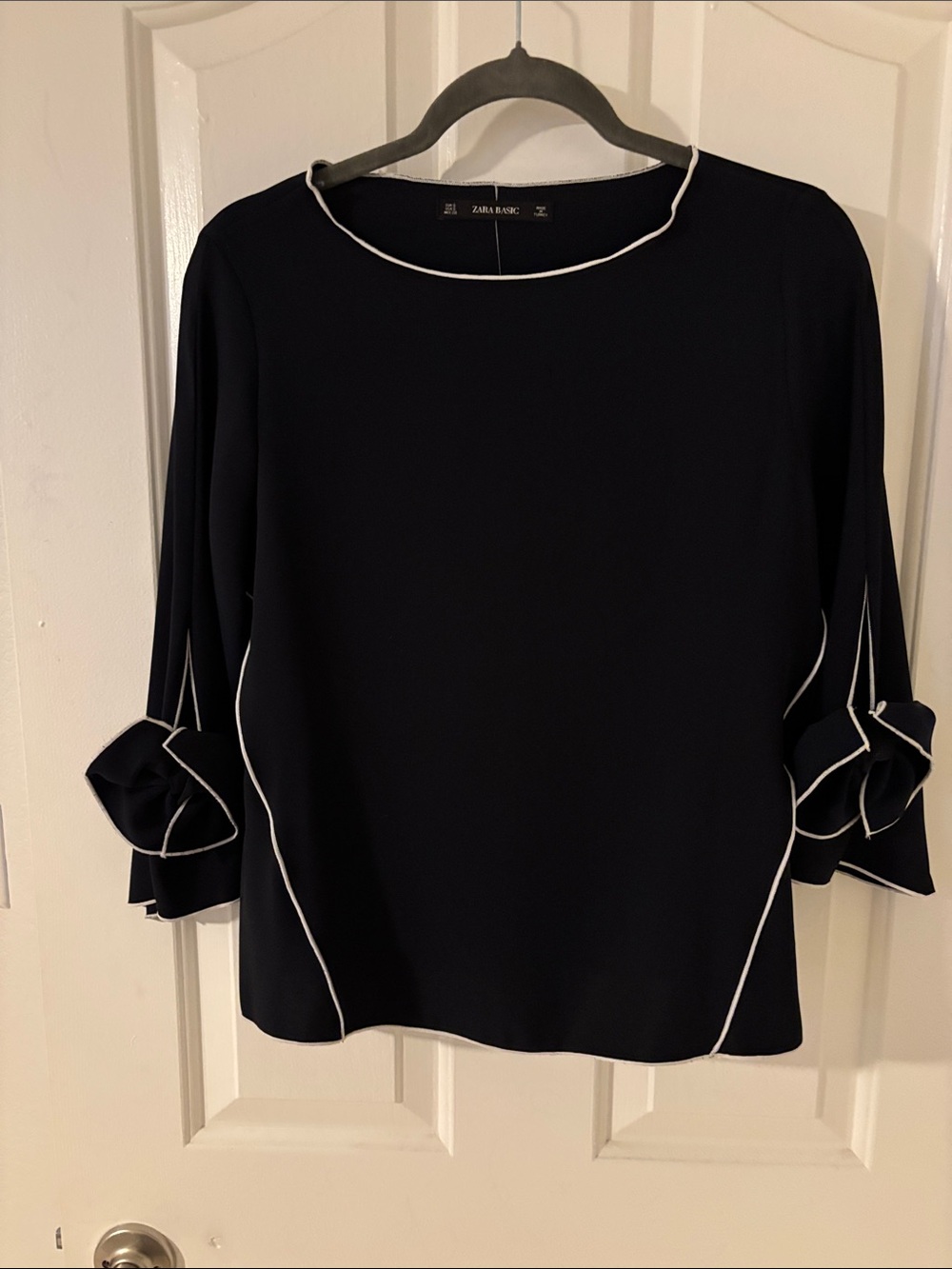 Zara Black Blouse with White Piping and Ruffle Flower Sleeve Accents